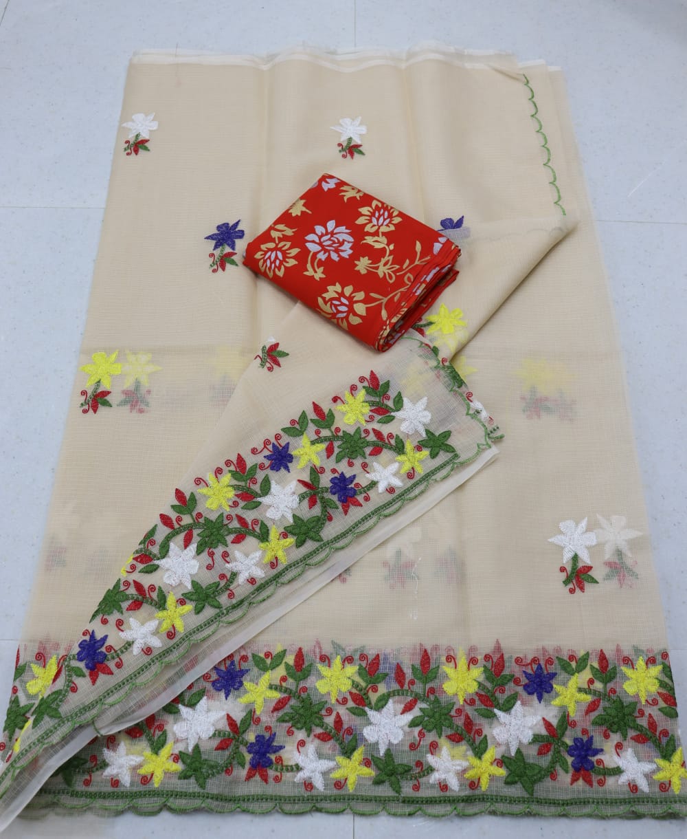Cream Colored Kota Doria Chickenkari Embroidery Saree With Contrast Printed Blouse